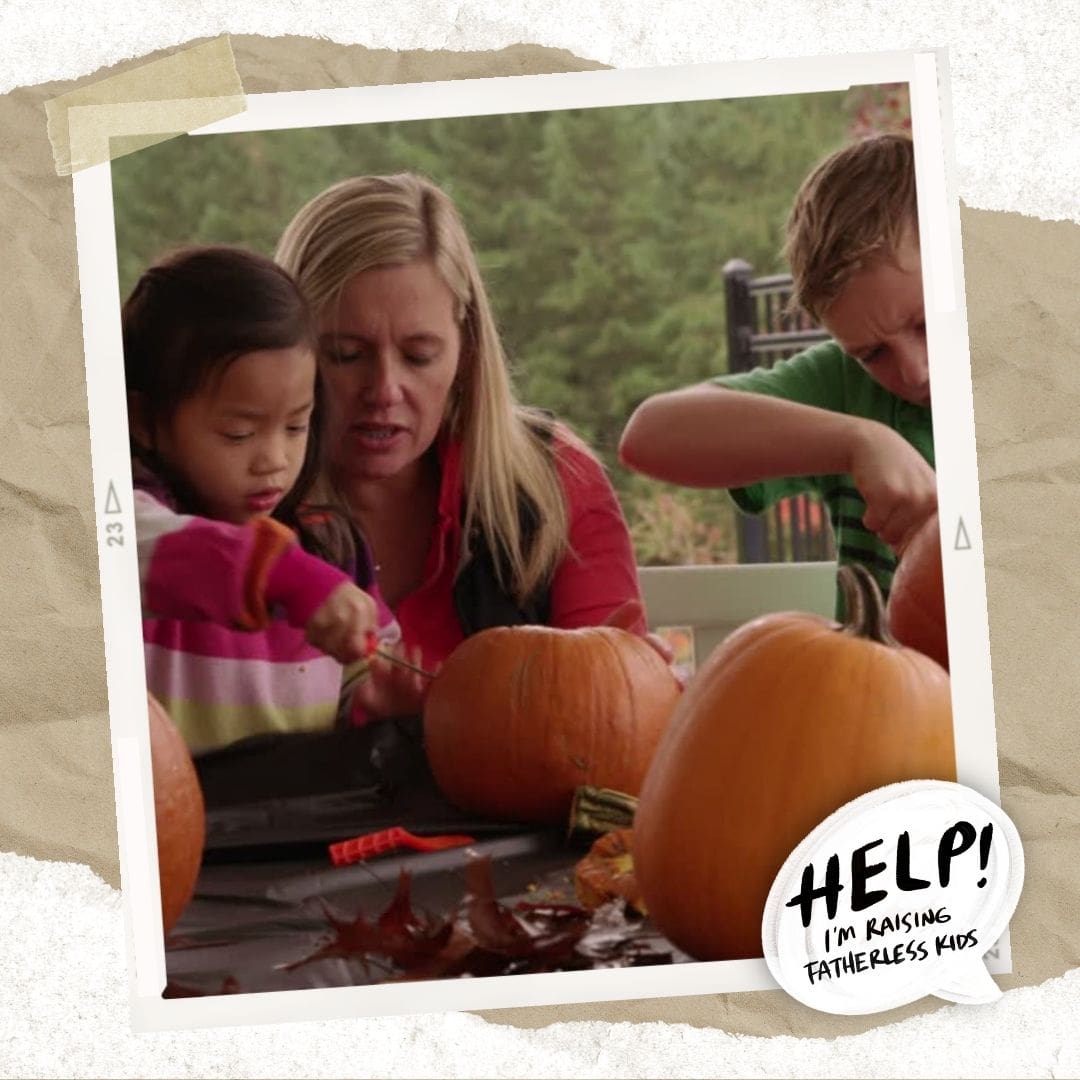 a mom carving pumpkins with her children